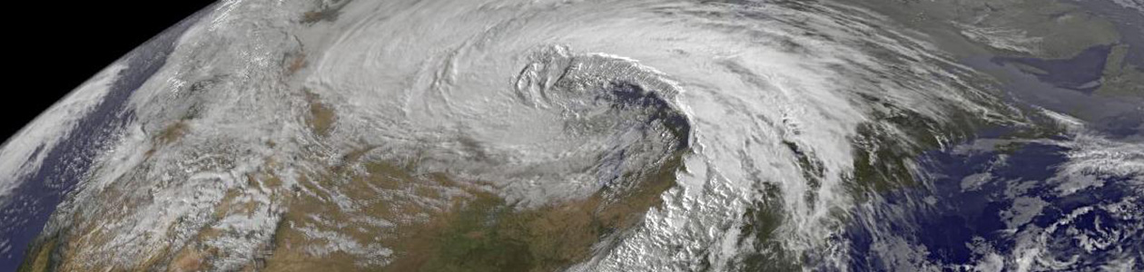 Satellite view of a large storm system spiralling over the eastern United States